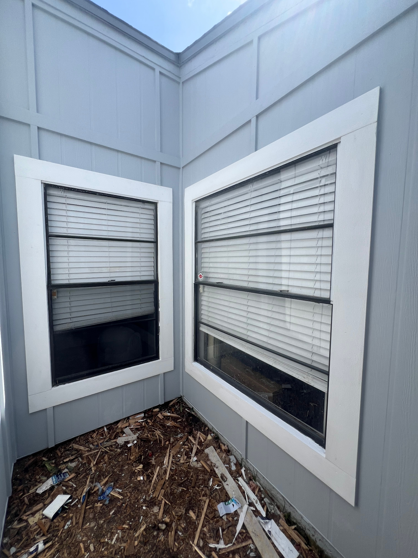 Restored windows with new trim and fresh paint